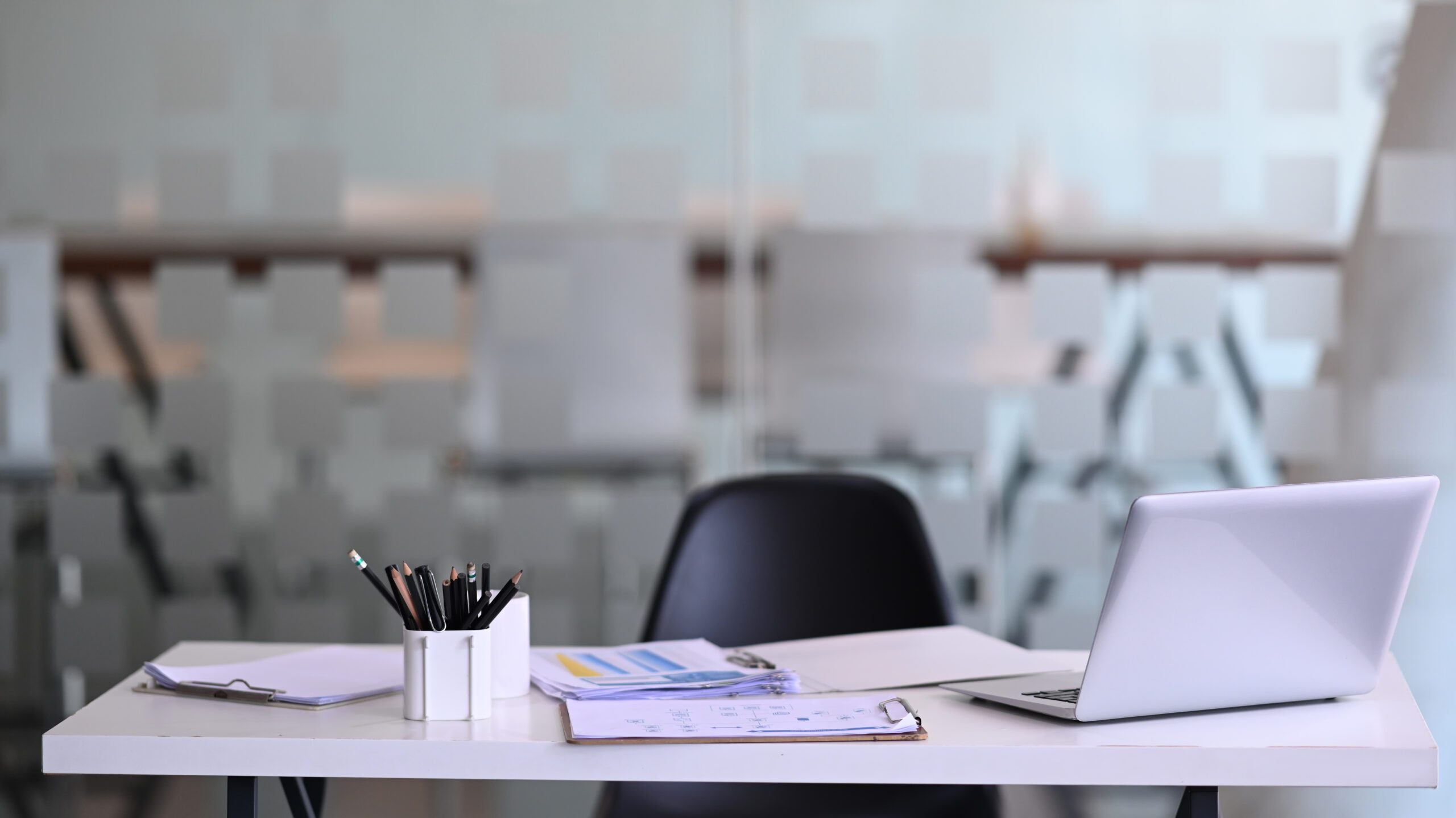 Manager working desk with laptop computer, document, paperwork a